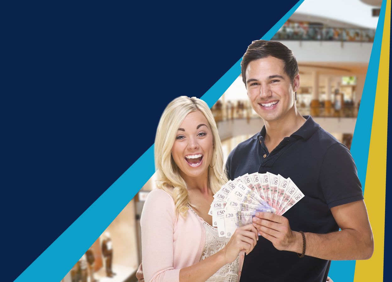 Happy couple holding cash